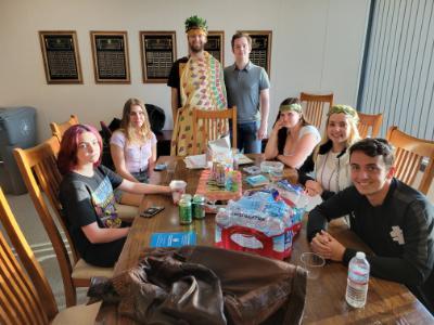 students sit at table